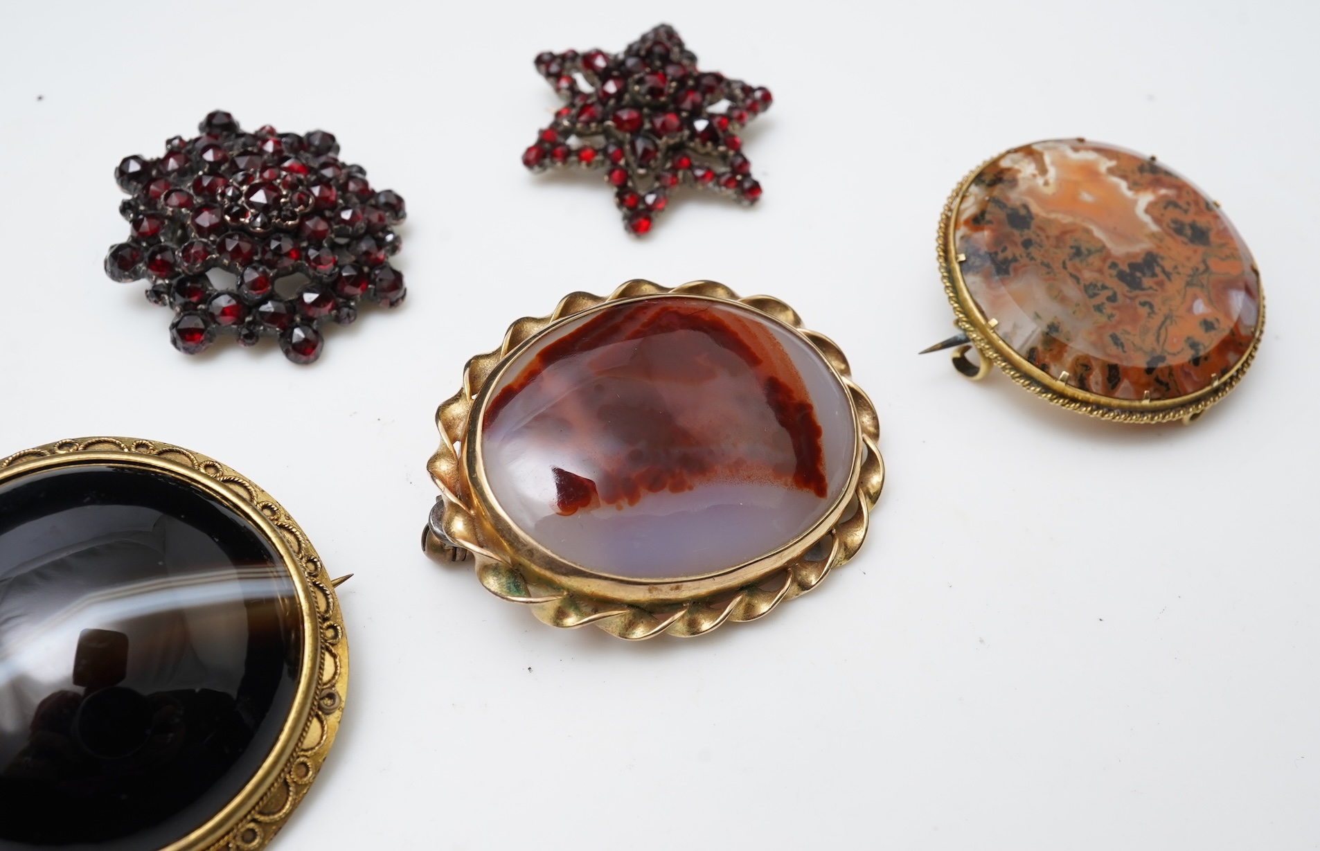 A collection of five brooches, 19th century